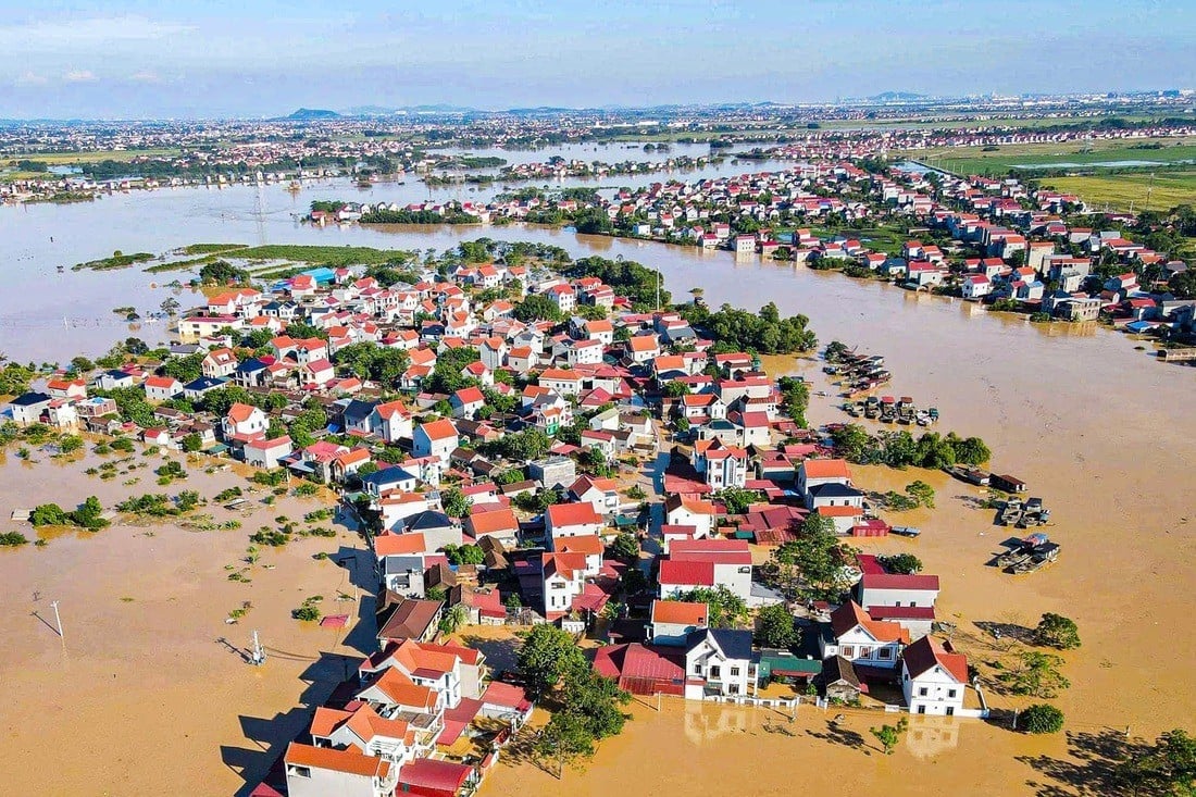 Lũ sông Cầu Bắc Ninh khiến nhiều thôn chìm trong biển nước , cuộc sống đảo lộn - Ảnh 2.