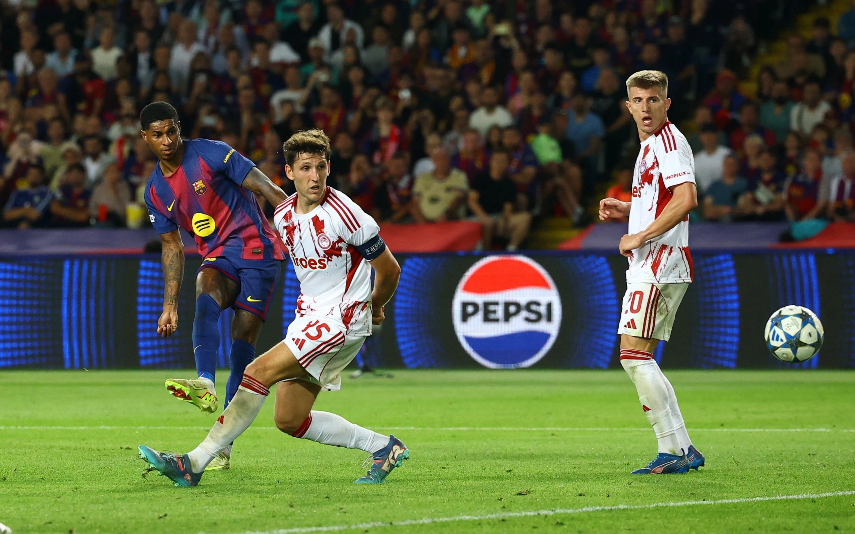 Barcelona dau Olympiacos anh 1