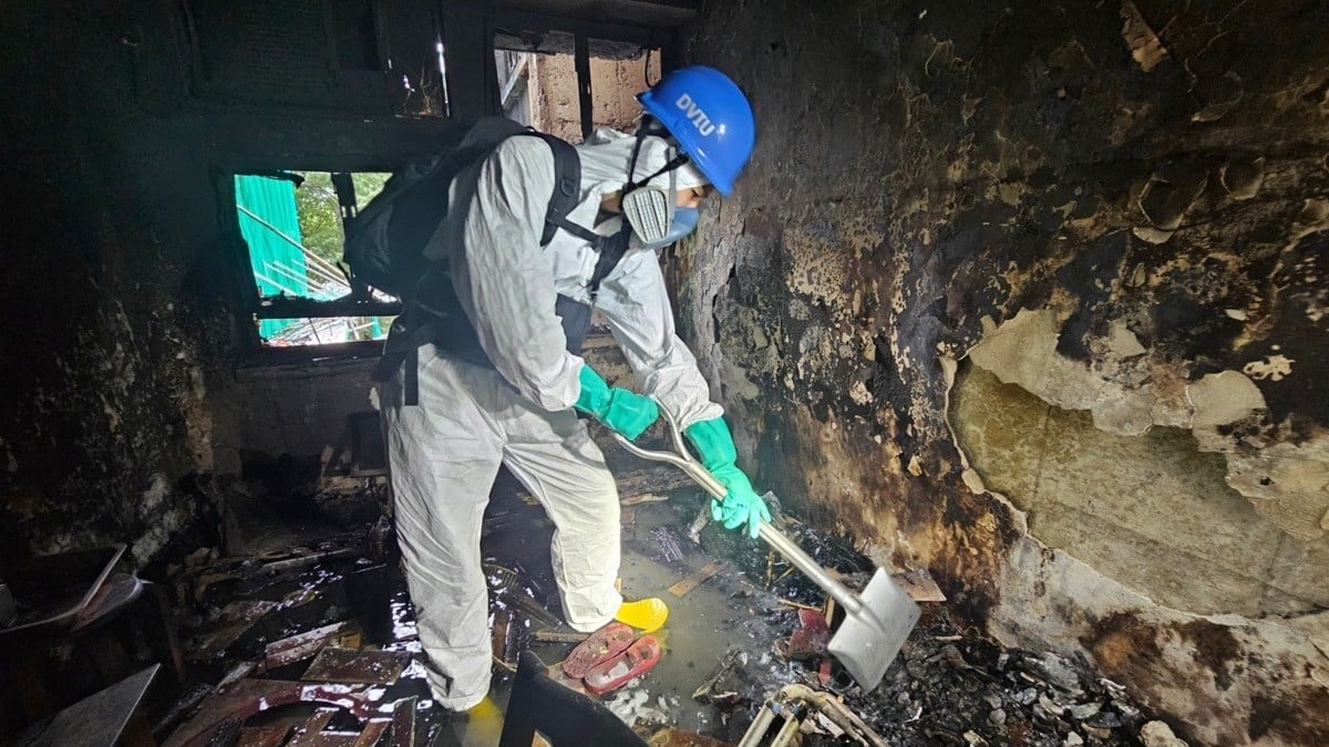 Cháy chung cư Hồng Kông: Thi thể hóa tro bụi, căn hộ cháy đen - Ảnh 3.