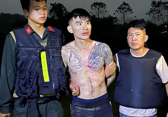 Lý Văn Vũ thời điểm bị bắt tại khu đồi ở Phú Thọ, ngày 15.1.2024. ảnh: Công an Phú Thọ