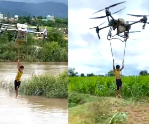 Nghẹt thở pha dùng drone hạng nặng giải cứu 2 bé mắc kẹt giữa dòng nước xiết