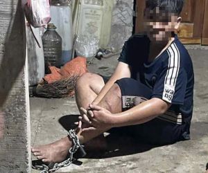 Điều tra vụ cháu bé nghi bị xích chân, đánh đập bằng thanh sắt
